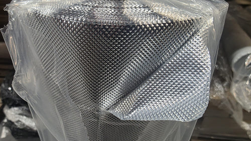 Diamond mylar reflective sheeting roll showing the diamond-textured surface
