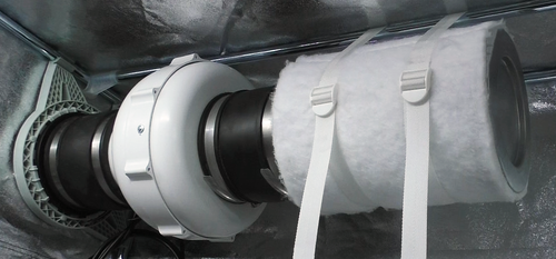 Secret Jardin rubber duct coupling fitted in use on a tent duct port