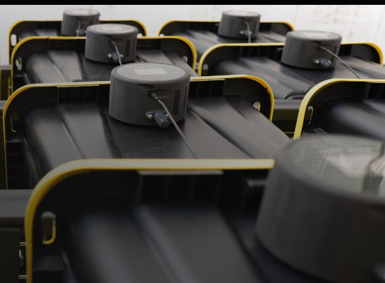 Twister Cure Puck Gen 2 units across a rack of curing containers
